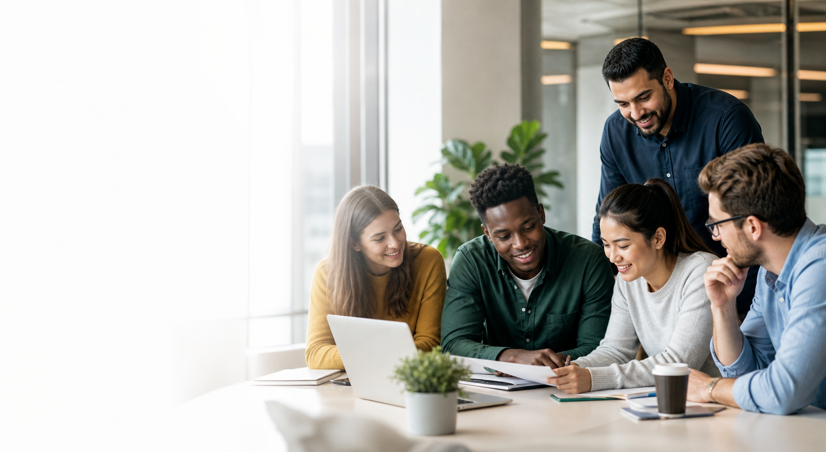 Young professionals learning together in a company training room